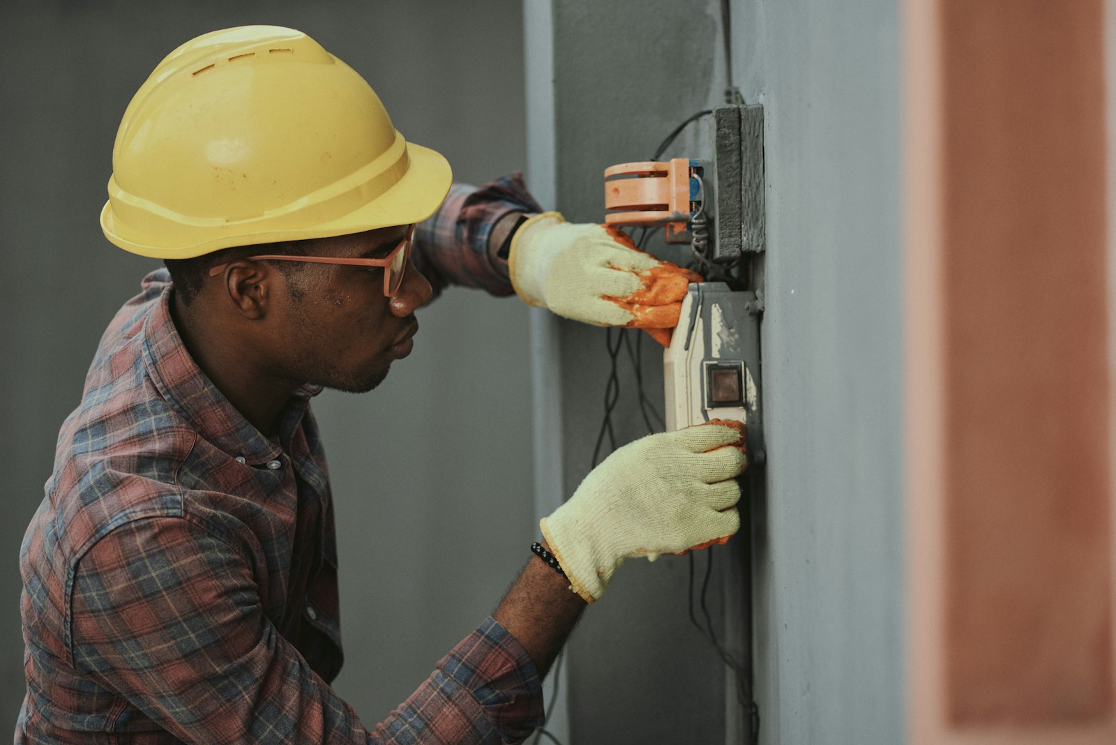Electrician wiring a consumer unit on a Basildon property