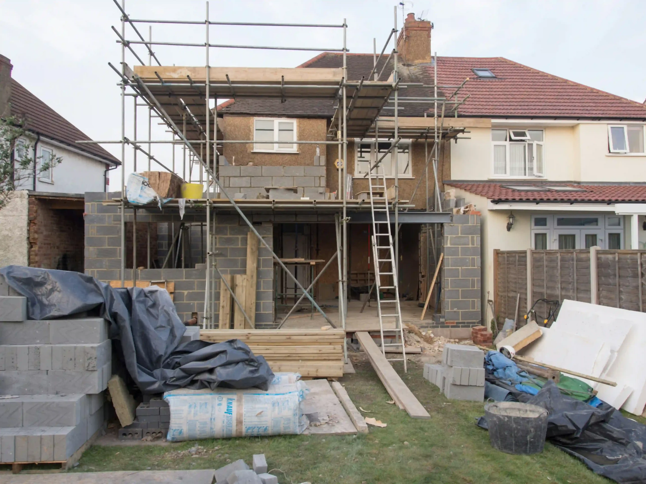 Builders working on a house extension
