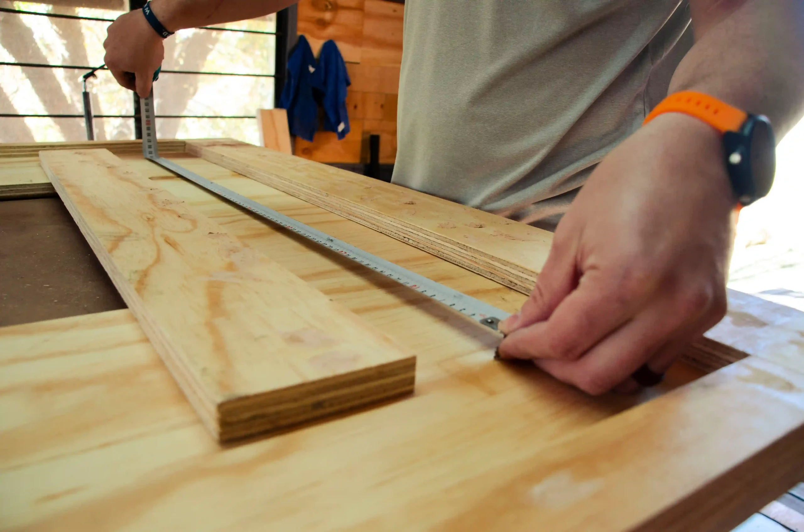 Carpenter working on timber in a workshop