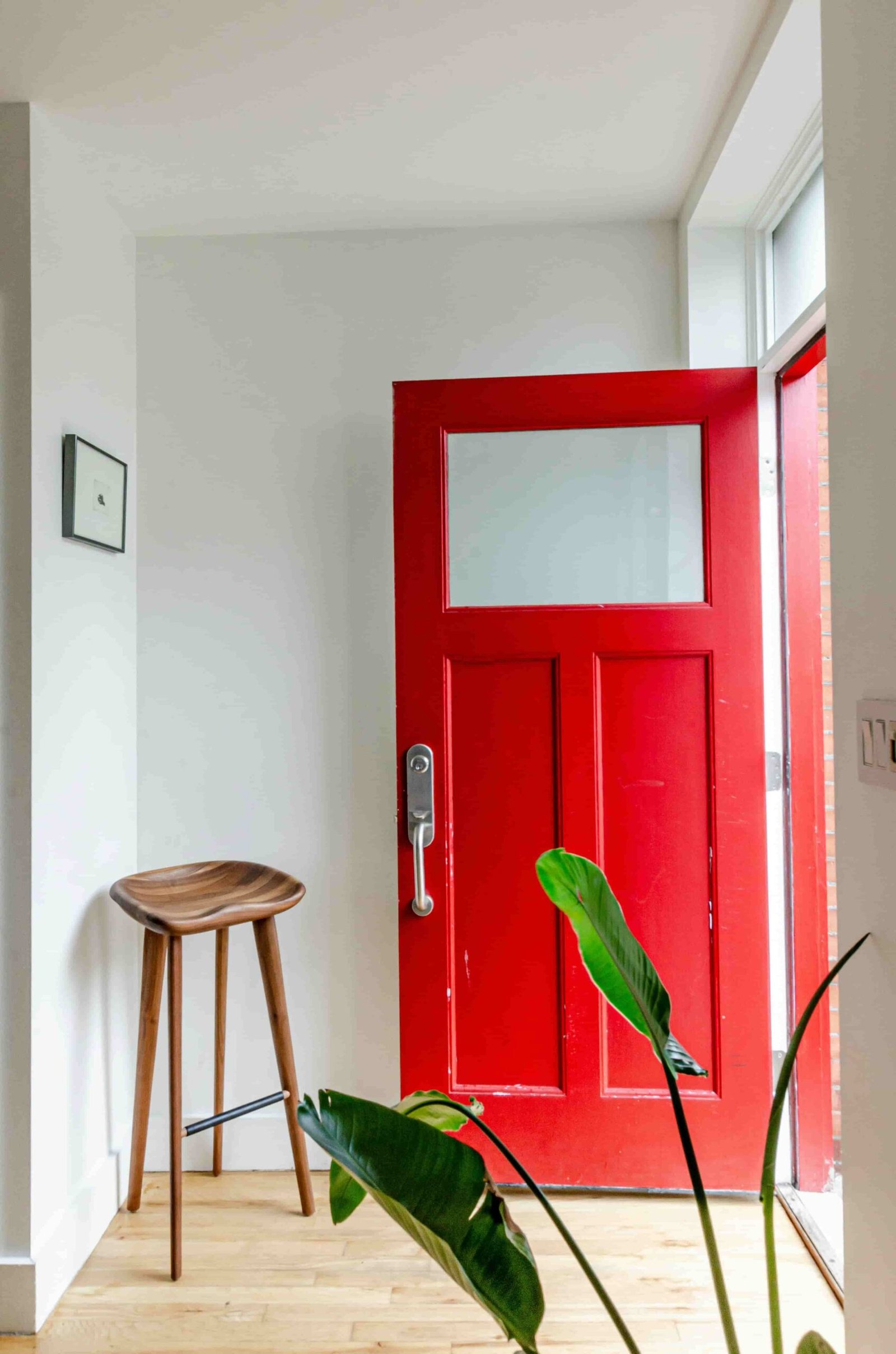Carpenter fitting an internal door frame