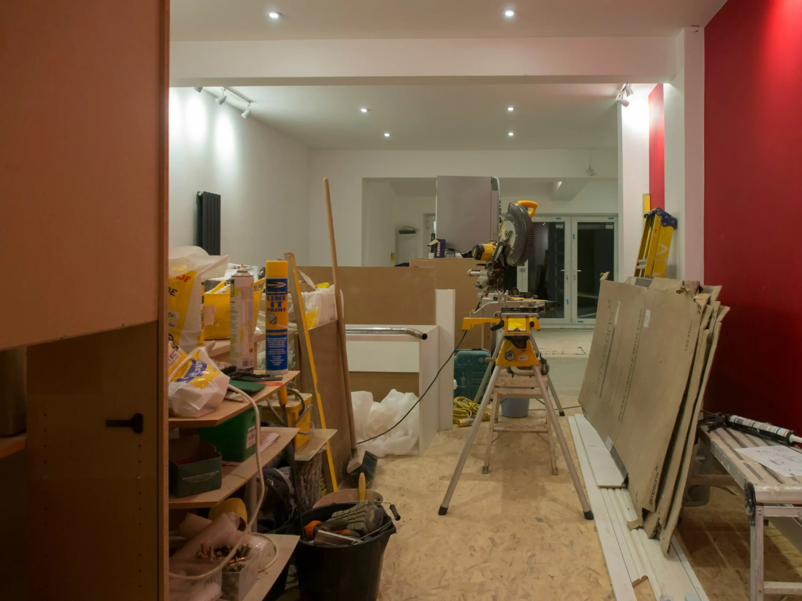 Carpenter fitting kitchen units and worktops
